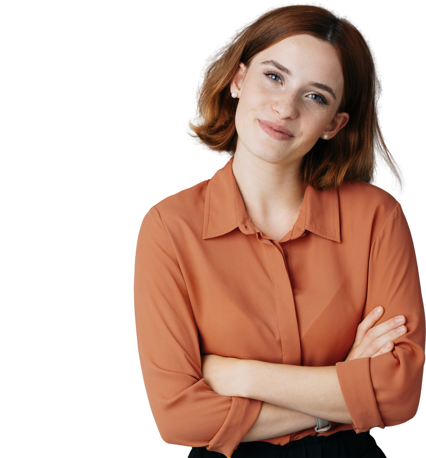 Smiling woman with crossed arms and tilted head.